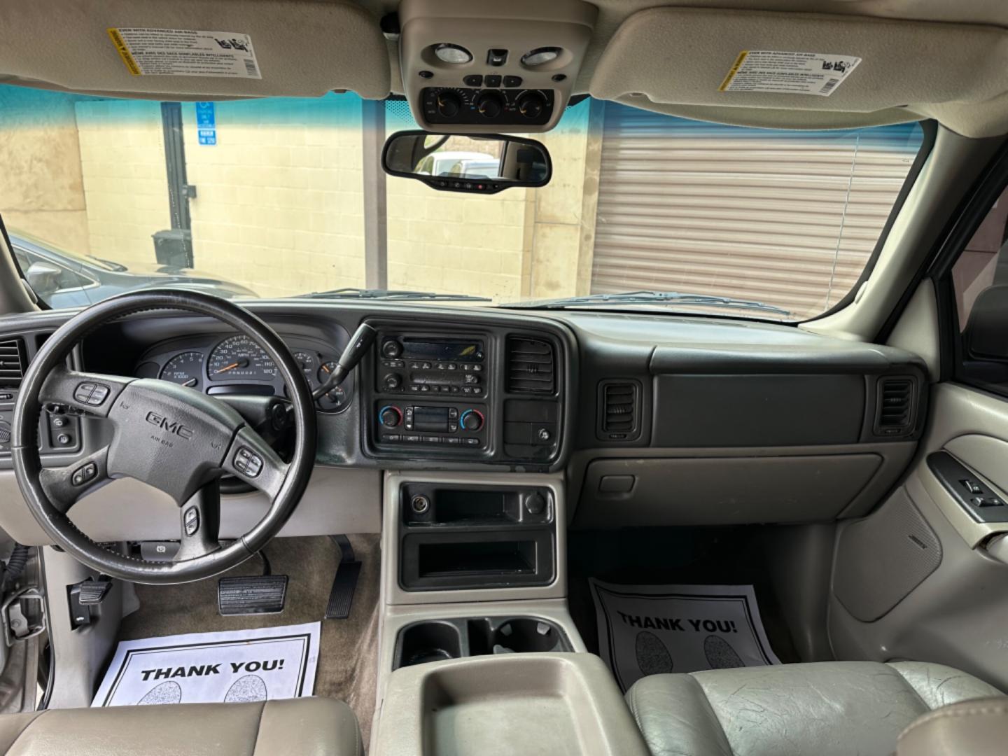 2006 BEIGE /Gray GMC Yukon SL 2WD (1GKEC13T66R) with an 5.3L V8 OHV 16V engine, 4-Speed Automatic Overdrive transmission, located at 30 S. Berkeley Avenue, Pasadena, CA, 91107, (626) 248-7567, 34.145447, -118.109398 - Embrace Power and Comfort: 2006 GMC Yukon with Leather, Moon-Roof, and Third-Row Seating Available in Pasadena, CA Step into the realm of rugged luxury with the 2006 GMC Yukon, now available at our BHPH dealership in Pasadena, CA. This robust SUV, featuring a luxurious leather interior, a moon-ro - Photo#17